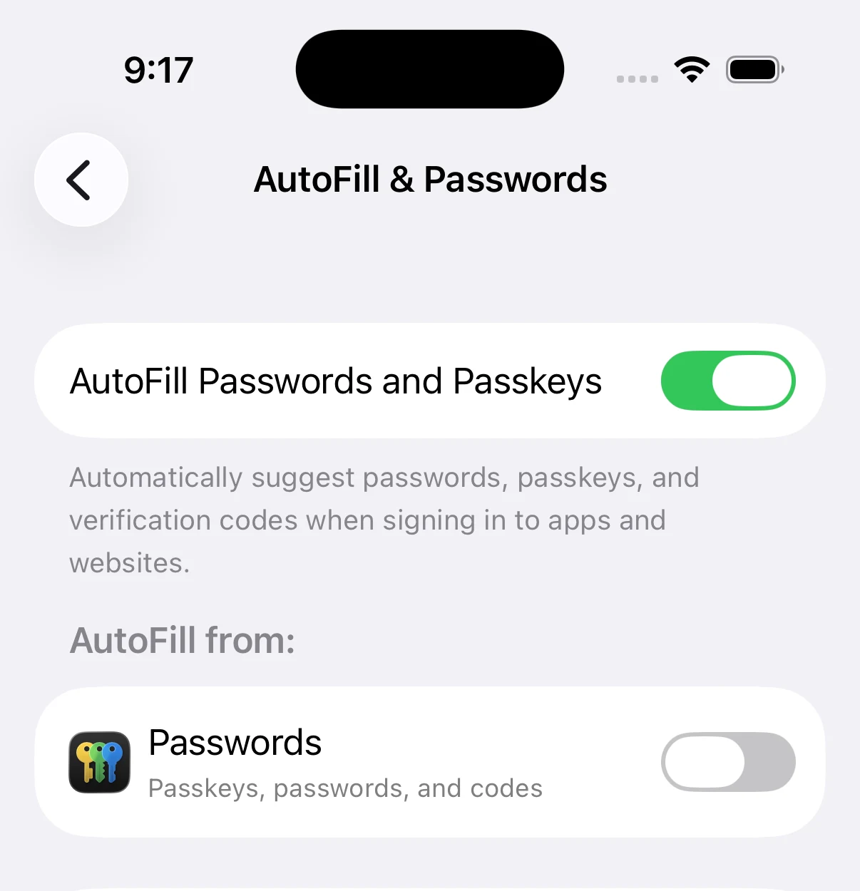 The same iPhone AutoFill & Passwords settings screen. The AutoFill Passwords and Passkeys switch at the top is still on, but the Passwords app below it now has its own switch turned off.
